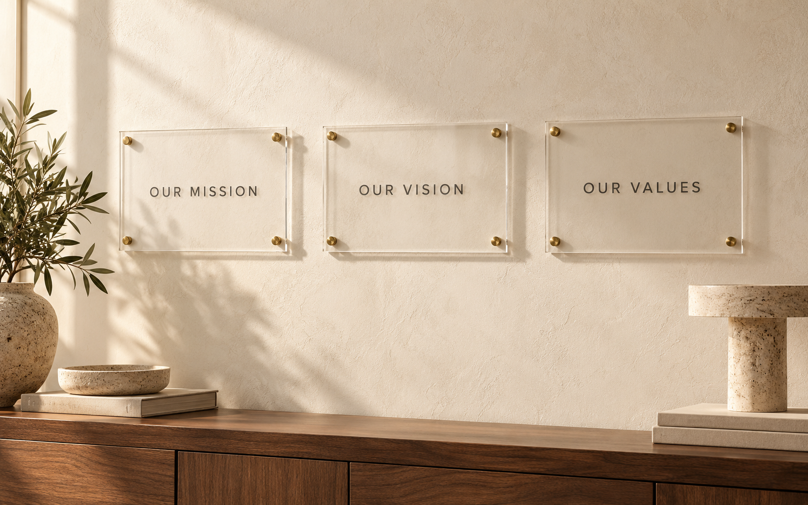 AI-generated editorial visualization of coordinated MISSION, VISION and VALUES wall plaques in a modern office.